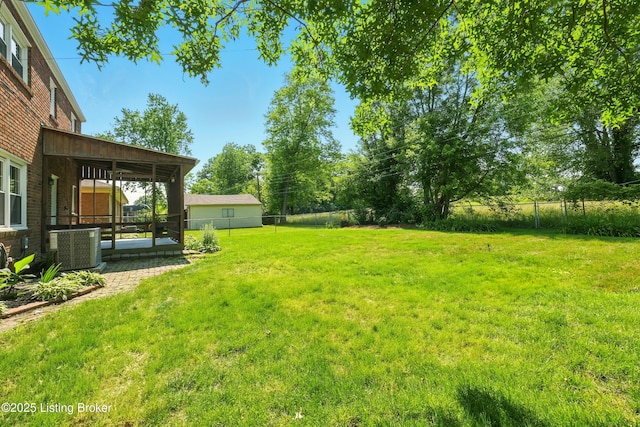 9809 Tiverton Way, Louisville, KY 40242 - view of yard with central AC and a sunroom