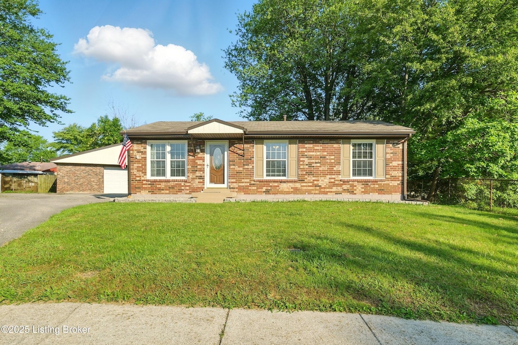 6503 Larch Ct, Louisville, KY 40229 - ranch-style house featuring brick siding and a detached garage