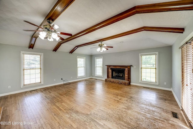 1124 Foxfire Rd, Bardstown, KY 40004 - unfurnished living room with a ceiling fan, a fireplace, and healthy amount of natural light