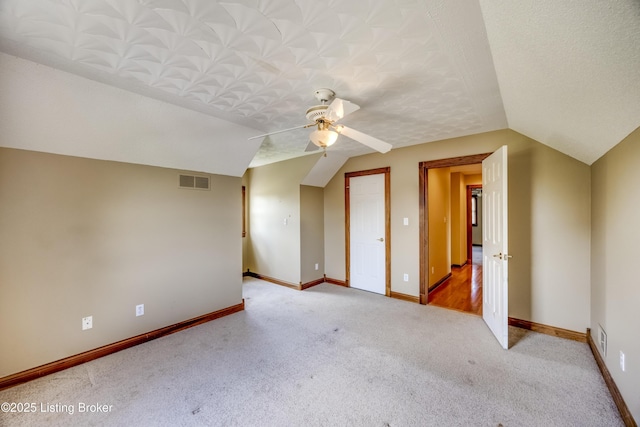 1124 Foxfire Rd, Bardstown, KY 40004 - additional living space with a ceiling fan, carpet flooring, and lofted ceiling