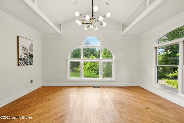 5115 Stony Brook Dr, Louisville, KY 40291 - spare room with a chandelier, lofted ceiling, light wood finished floors, baseboards, and ornamental molding