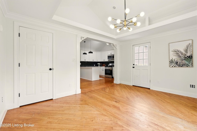 5115 Stony Brook Dr, Louisville, KY 40291 - foyer entrance featuring a chandelier, light wood finished floors, lofted ceiling, baseboards, and crown molding