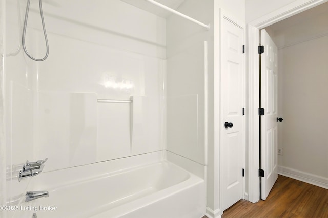 5115 Stony Brook Dr, Louisville, KY 40291 - full bath with bathtub / shower combination, wood finished floors, and baseboards