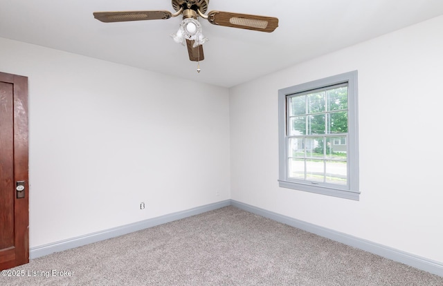 1108 Dresden Ave, Louisville, KY 40215 - unfurnished room featuring carpet flooring, baseboards, and a ceiling fan