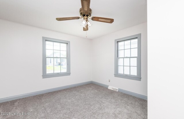 1108 Dresden Ave, Louisville, KY 40215 - carpeted empty room with healthy amount of natural light, baseboards, and ceiling fan