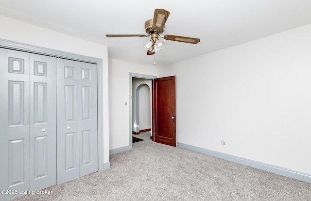 1108 Dresden Ave, Louisville, KY 40215 - unfurnished bedroom featuring carpet, baseboards, a closet, and a ceiling fan