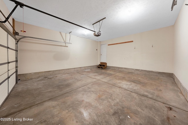 9400 Minute Men Ct, Louisville, KY 40214 - garage featuring a garage door opener