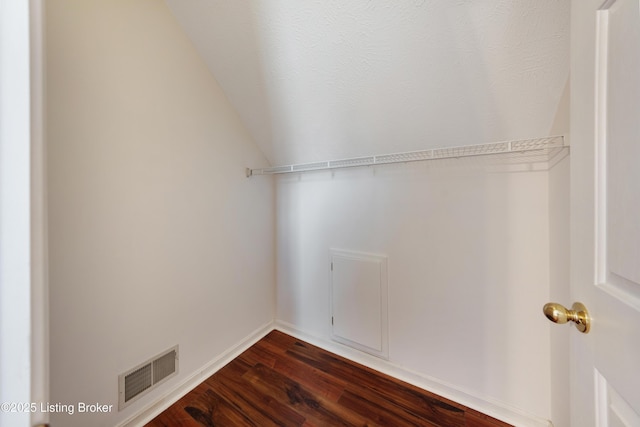 9400 Minute Men Ct, Louisville, KY 40214 - spacious closet with vaulted ceiling and dark wood-style flooring