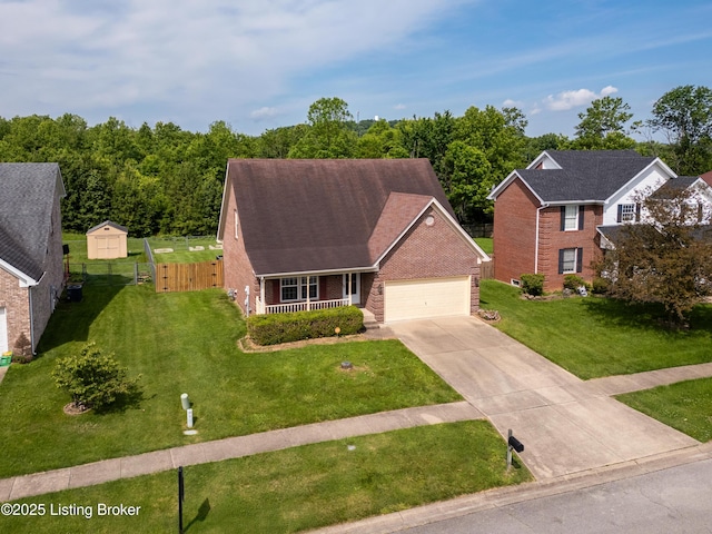 9400 Minute Men Ct, Louisville, KY 40214 - view of front of house with brick siding, covered porch, concrete driveway, and an attached garage