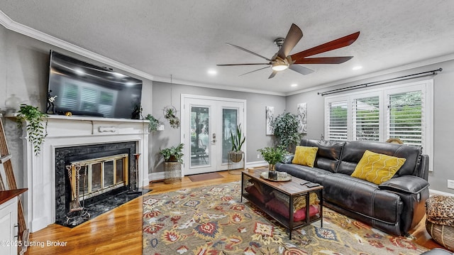 5531 Forest Lake Dr, Prospect, KY 40059 - living room with a ceiling fan, crown molding, a premium fireplace, wood finished floors, and recessed lighting