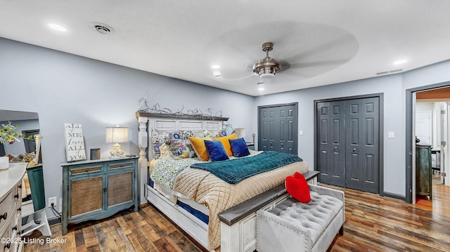 5531 Forest Lake Dr, Prospect, KY 40059 - bedroom featuring two closets, dark wood-type flooring, recessed lighting, and a ceiling fan