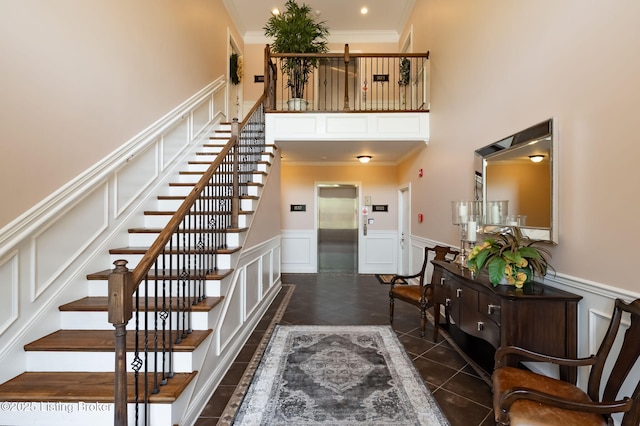 15323 Royal Troon Ave, Louisville, KY 40245 - stairway with a decorative wall, ornamental molding, wainscoting, a towering ceiling, and elevator