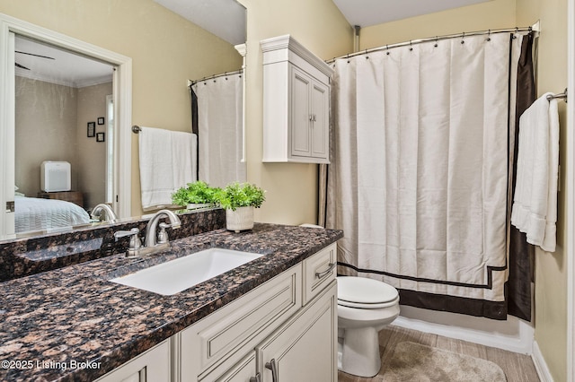 15323 Royal Troon Ave, Louisville, KY 40245 - bathroom featuring toilet, vanity, connected bathroom, and baseboards