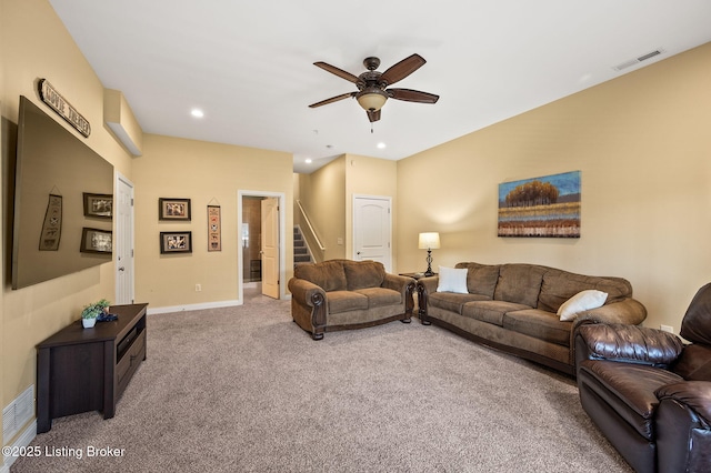 15323 Royal Troon Ave, Louisville, KY 40245 - living room featuring light colored carpet, stairs, a ceiling fan, baseboards, and recessed lighting