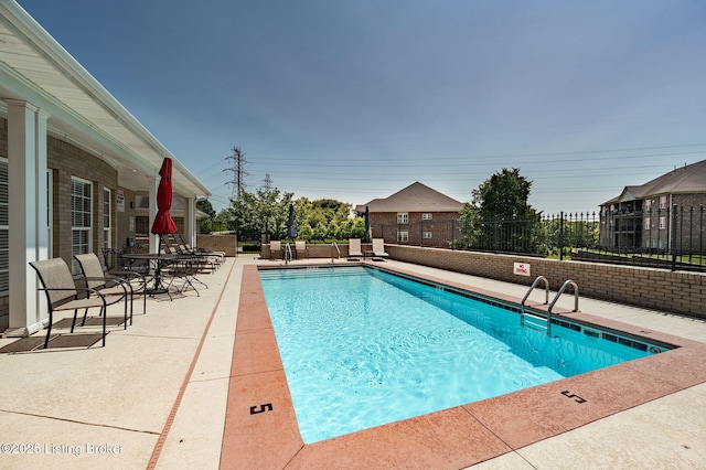 15323 Royal Troon Ave, Louisville, KY 40245 - community pool with a patio area
