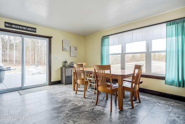 3412 Boyds Knob Rd, Munfordville, KY 42765 - dining space featuring baseboards