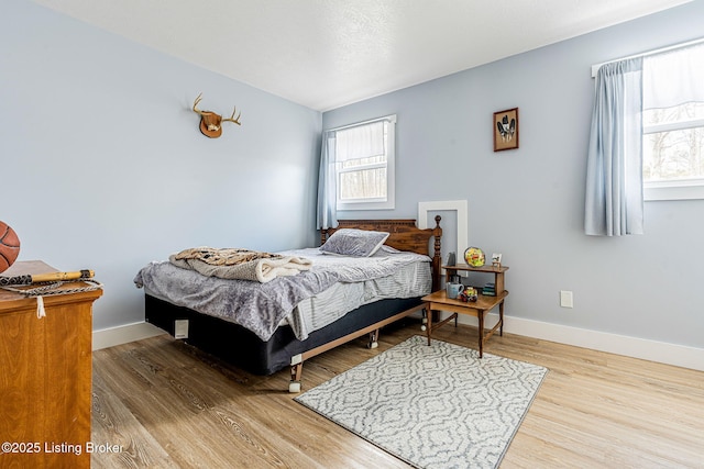 3412 Boyds Knob Rd, Munfordville, KY 42765 - bedroom with wood finished floors and baseboards