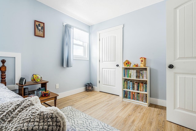 3412 Boyds Knob Rd, Munfordville, KY 42765 - bedroom with baseboards and wood finished floors