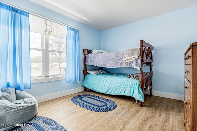 3412 Boyds Knob Rd, Munfordville, KY 42765 - bedroom featuring wood finished floors and baseboards