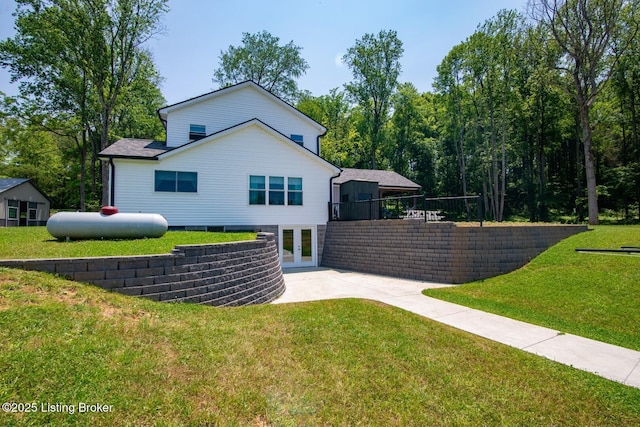 3412 Boyds Knob Rd, Munfordville, KY 42765 - back of property with french doors and a yard