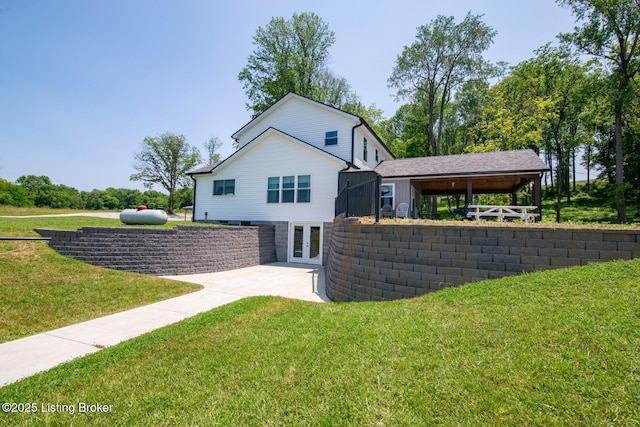 3412 Boyds Knob Rd, Munfordville, KY 42765 - back of house with french doors, a yard, and a patio