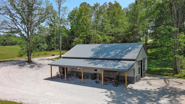 3412 Boyds Knob Rd, Munfordville, KY 42765 - view of front of property featuring metal roof, an outbuilding, and an outdoor structure