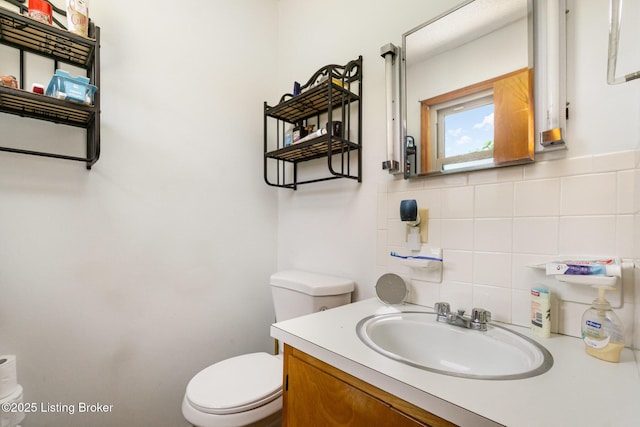 61 Dee St, Elizabethtown, KY 42701 - half bathroom with toilet, vanity, and tile walls
