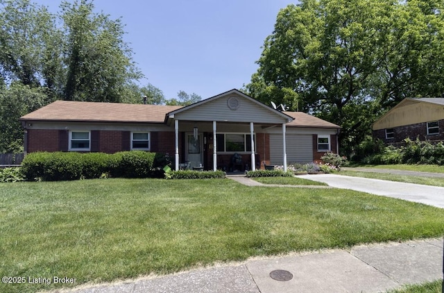 1972 Alice Dr, Lexington, KY 40511 - single story home with a front lawn, a porch, brick siding, and driveway
