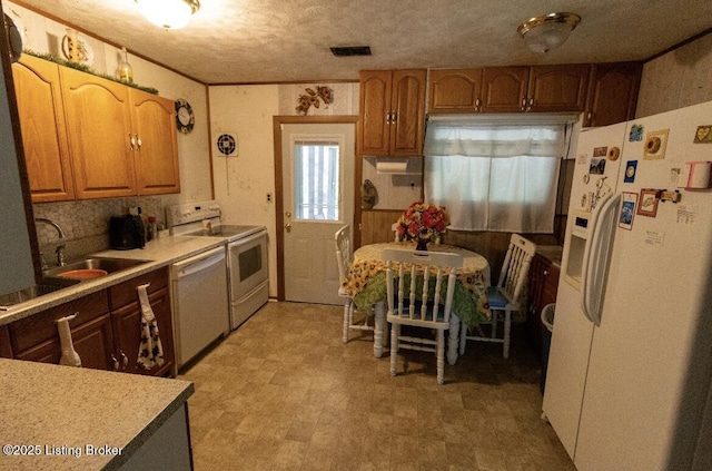 1972 Alice Dr, Lexington, KY 40511 - kitchen featuring white appliances, light flooring, a sink, and light countertops