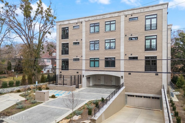 1576 Cherokee Rd Unit 1, Louisville, KY 40205 - view of building exterior featuring an attached garage