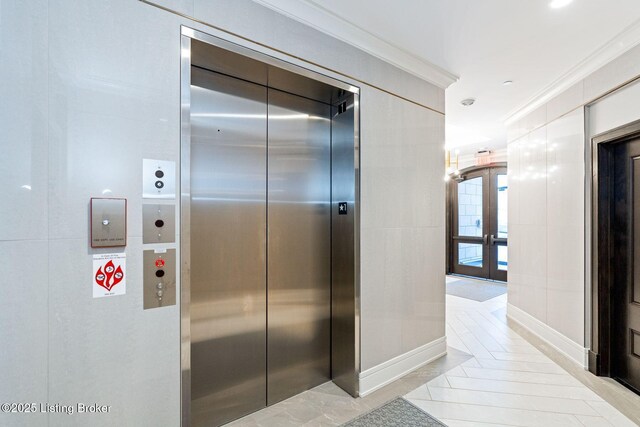 1576 Cherokee Rd Unit 1, Louisville, KY 40205 - hall featuring elevator, french doors, and ornamental molding