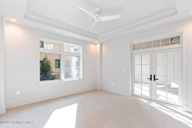 1576 Cherokee Rd Unit 1, Louisville, KY 40205 - unfurnished room featuring a raised ceiling, ornamental molding, light carpet, french doors, and a ceiling fan