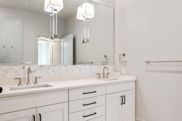 1576 Cherokee Rd Unit 1, Louisville, KY 40205 - bathroom with double vanity and backsplash