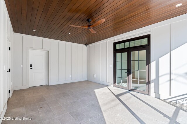 1576 Cherokee Rd Unit 1, Louisville, KY 40205 - empty room featuring french doors, wooden ceiling, a ceiling fan, a decorative wall, and recessed lighting