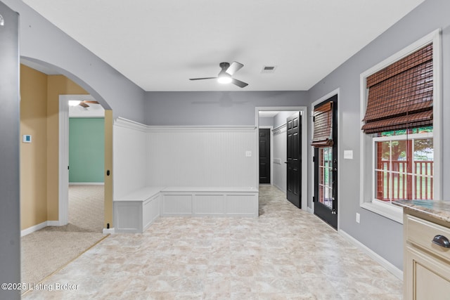 103 Maggie Ln, Bardstown, KY 40004 - spare room with a ceiling fan, arched walkways, and wainscoting
