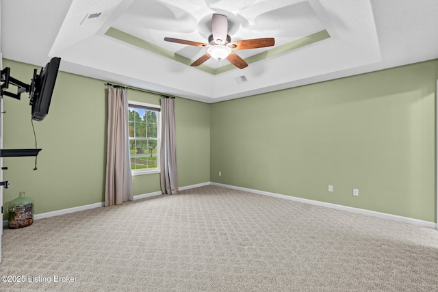 103 Maggie Ln, Bardstown, KY 40004 - empty room with a tray ceiling, a ceiling fan, carpet floors, and baseboards