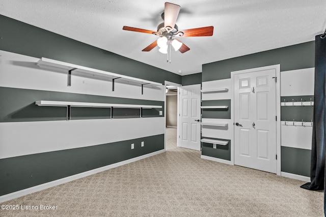 103 Maggie Ln, Bardstown, KY 40004 - unfurnished bedroom with carpet floors, baseboards, a textured ceiling, and ceiling fan