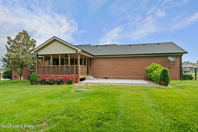 103 Maggie Ln, Bardstown, KY 40004 - back of property featuring ceiling fan, a lawn, brick siding, and a patio