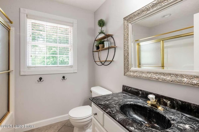 103 Deer Grove Ct, Elizabethtown, KY 42701 - full bathroom with a shower with shower door, vanity, toilet, tile patterned floors, and baseboards