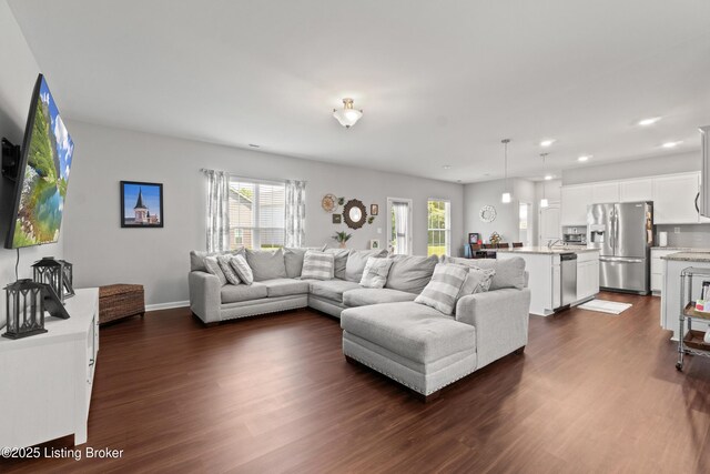 6719 Meadow Park Dr, Louisville, KY 40291 - living room featuring dark wood-type flooring, recessed lighting, and baseboards