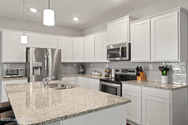 6719 Meadow Park Dr, Louisville, KY 40291 - kitchen featuring appliances with stainless steel finishes, a sink, backsplash, and recessed lighting