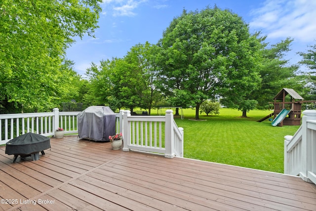 6209 Interlaken Way, Prospect, KY 40059 - wooden terrace featuring a playground, a lawn, and a grill
