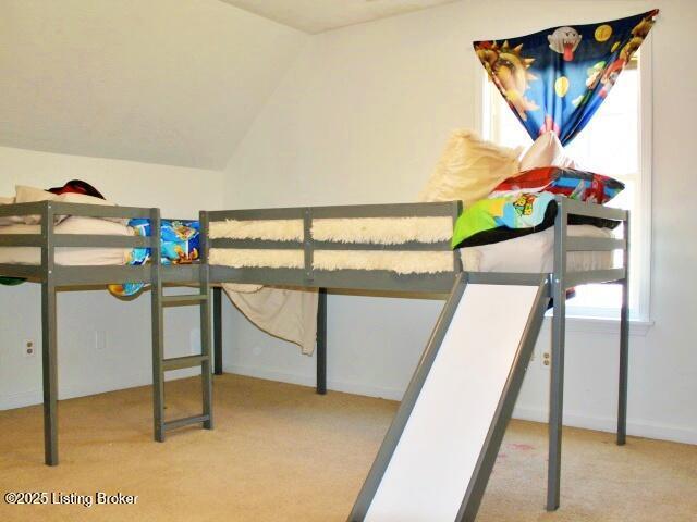 1071 Greenway Dr, Elizabethtown, KY 42701 - unfurnished bedroom featuring carpet floors and vaulted ceiling