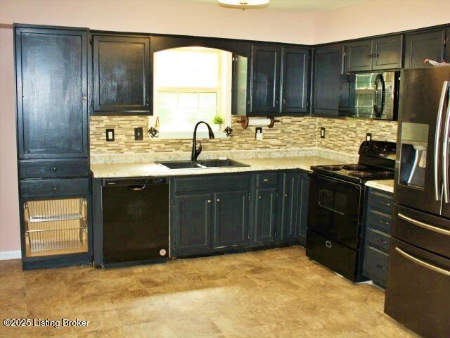 1071 Greenway Dr, Elizabethtown, KY 42701 - kitchen featuring black appliances, a sink, light countertops, backsplash, and dark cabinets