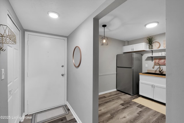 2300 Dundee Rd Unit 2, Louisville, KY 40205 - foyer entrance featuring wood finished floors and baseboards
