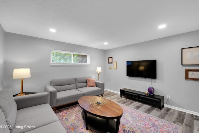 2300 Dundee Rd Unit 2, Louisville, KY 40205 - living area with wood finished floors, recessed lighting, and baseboards