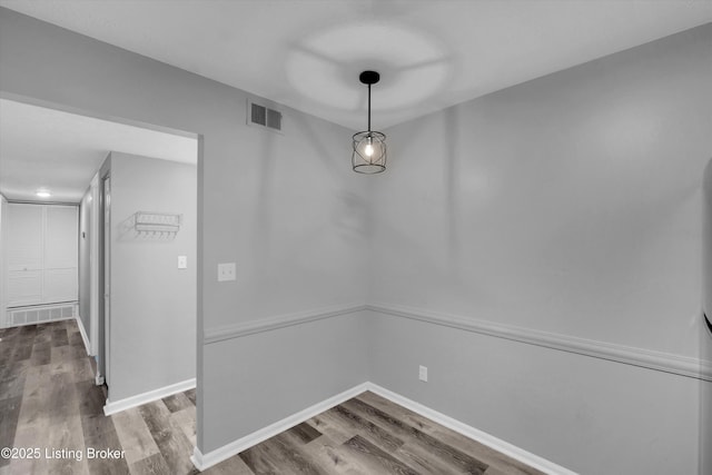 2300 Dundee Rd Unit 2, Louisville, KY 40205 - unfurnished dining area with wood finished floors and baseboards