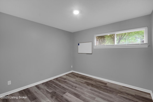 2300 Dundee Rd Unit 2, Louisville, KY 40205 - spare room with dark wood-style flooring and baseboards