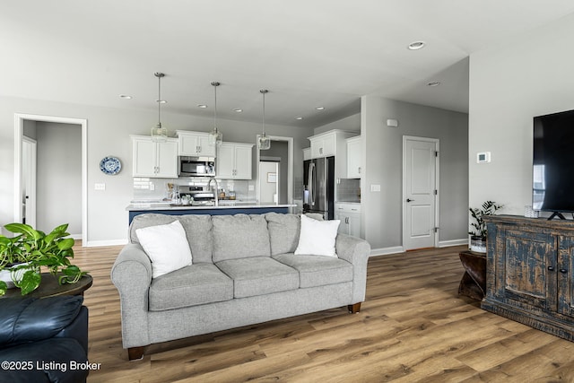 2824 Alder Wood Ln, La Grange, KY 40031 - living room with recessed lighting, baseboards, and wood finished floors