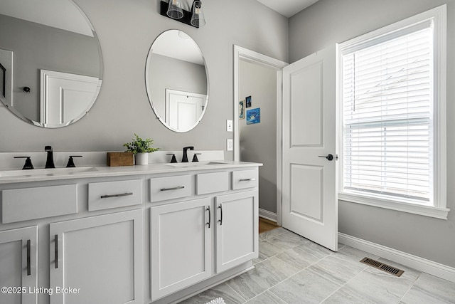 2824 Alder Wood Ln, La Grange, KY 40031 - bathroom with double vanity and baseboards
